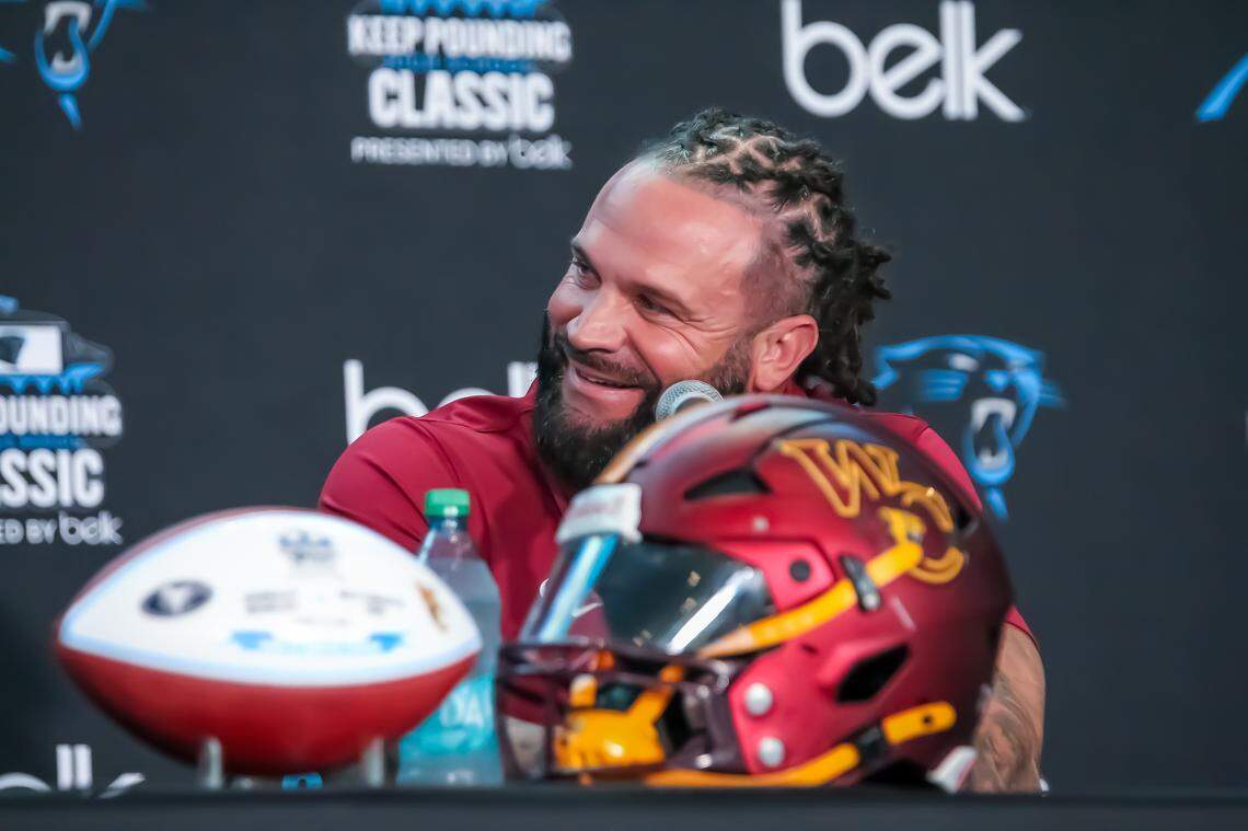 West Charlotte coach Sam Greiner speaks with the media during Wednesday’s Carolina Panthers’ Keep Pounding media day at Bank of America Stadium on May 7, 2025