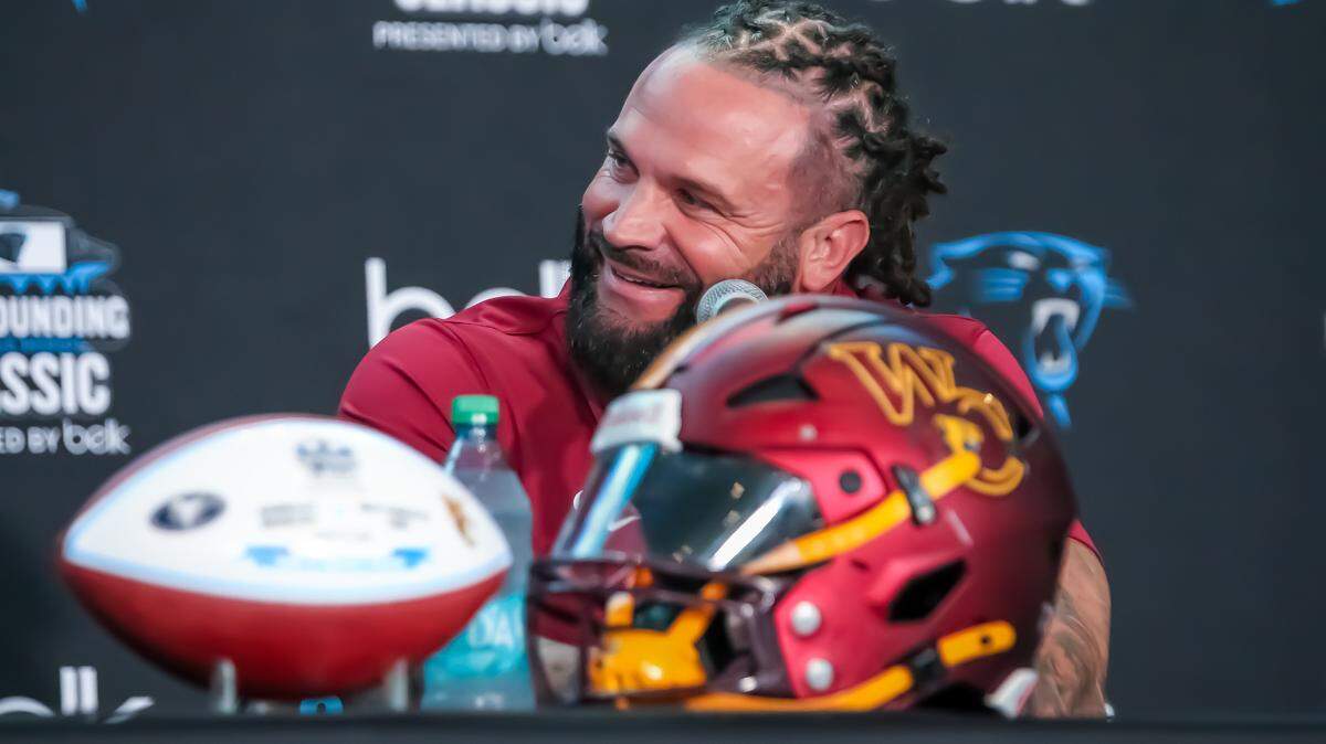 West Charlotte coach Sam Greiner speaks with the media during Wednesday’s Carolina Panthers’ Keep Pounding media day at Bank of America Stadium on May 7, 2025