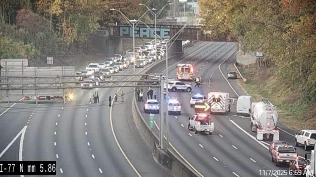I-77 was closed near Exit 6A around 7 a.m. Friday after a crash that knocked down power lines.