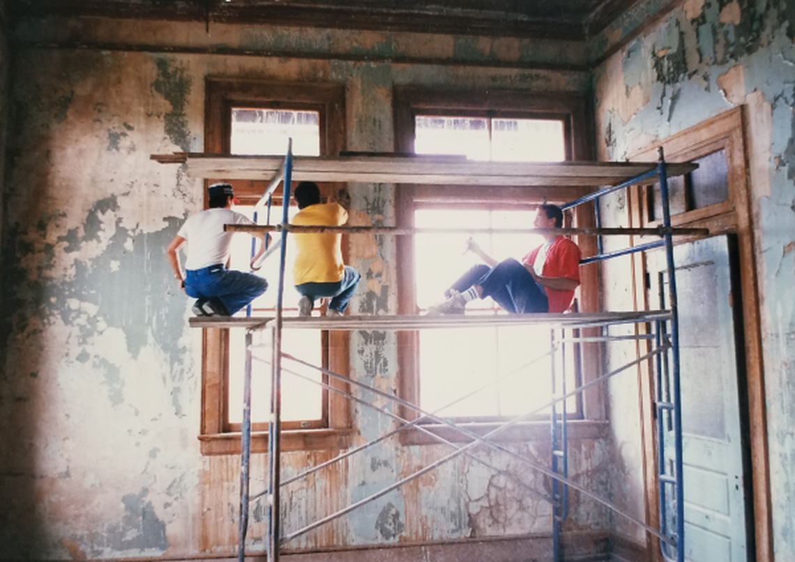 Members of Historic Salisbury Foundation performing restoration work in Salisbury Depot’s west parlor.