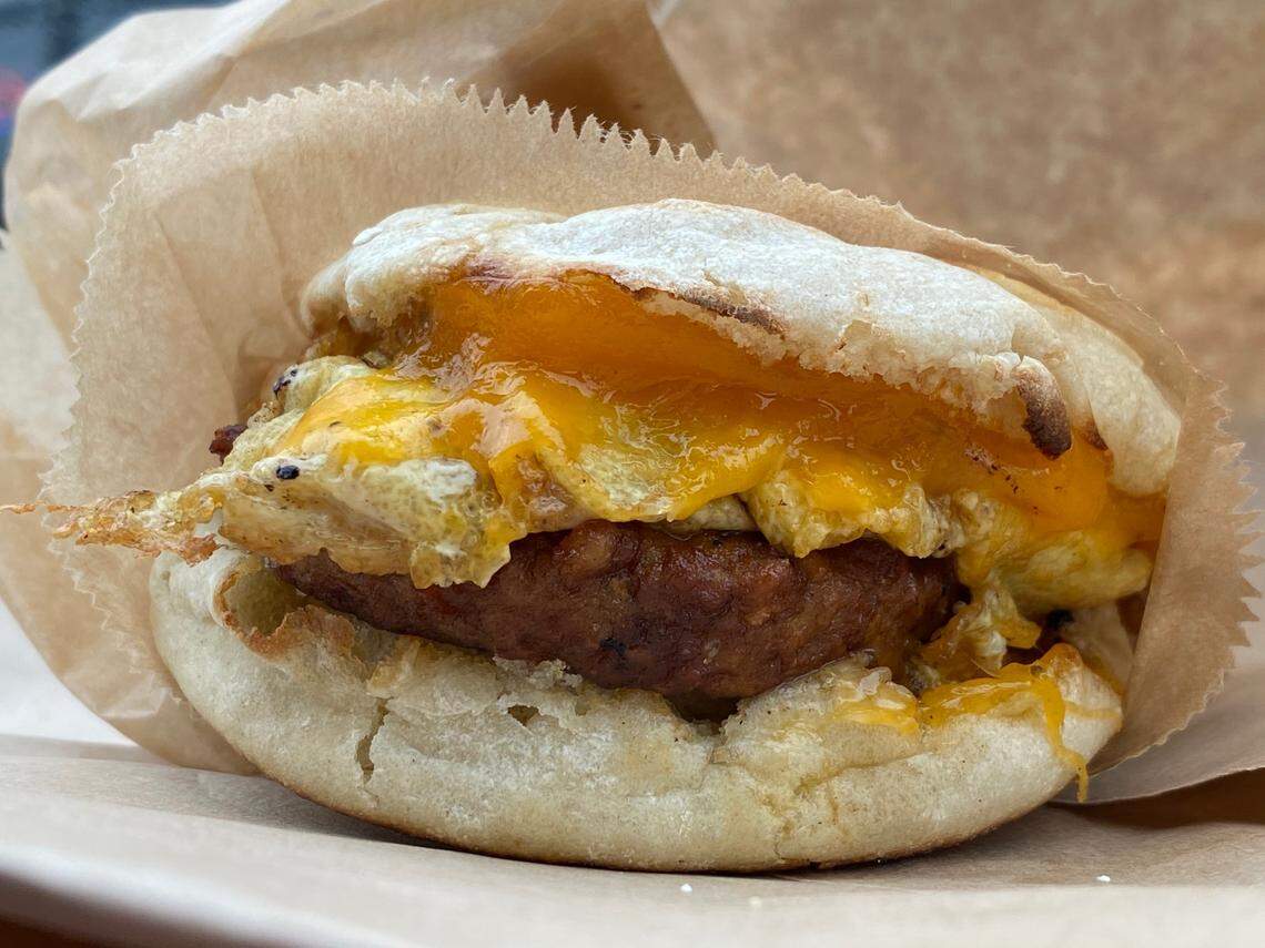 Rhino Market & Deli’s Classic English Muffin Sandwich comes with scrambled egg, one protein (Soysage shown), one cheese (Boar’s Head Sharp Wisconsin Cheddar shown).&nbsp;