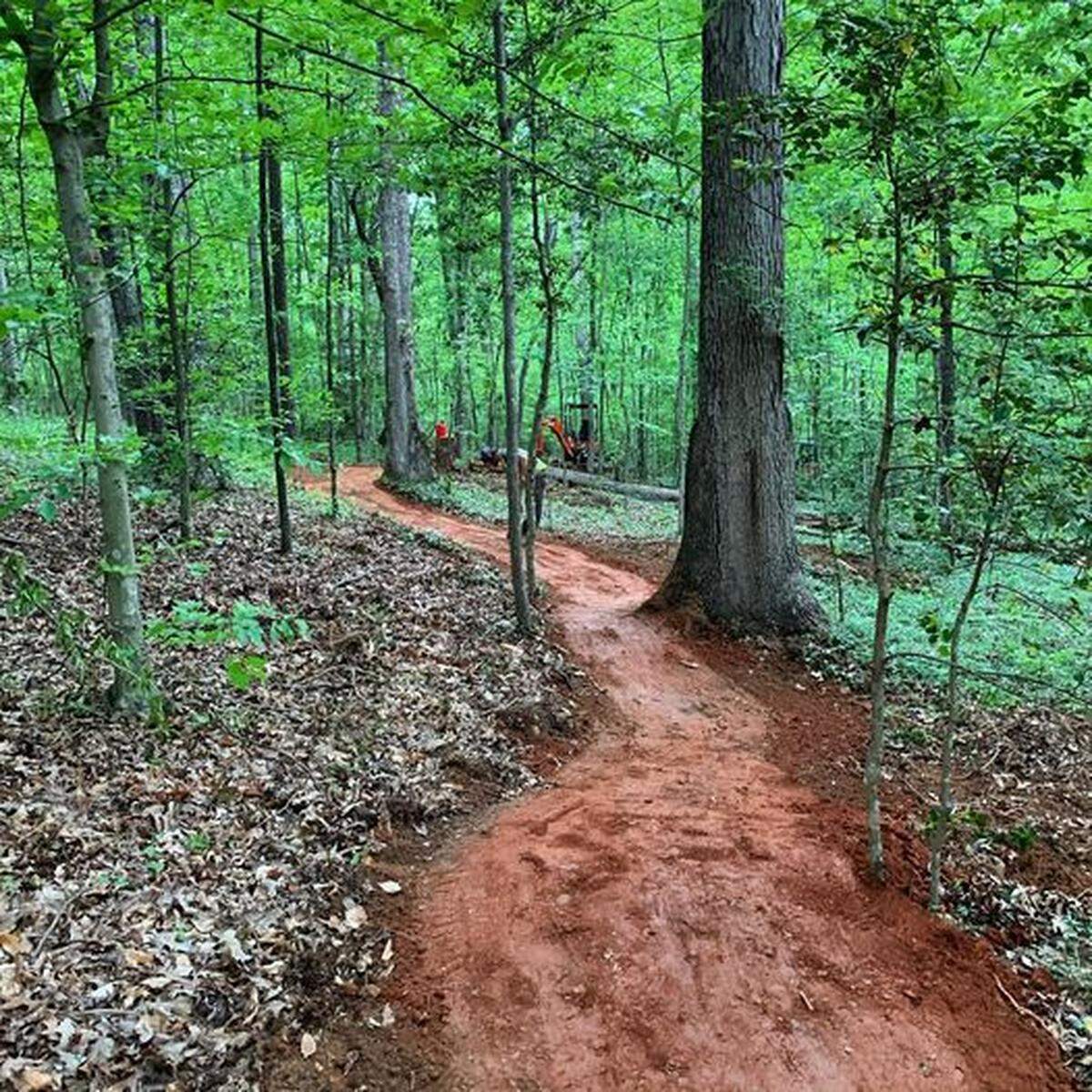 A crew with Elevated Trail Design LLC has finished 13 miles of a planned 19-mile network of hiking and mountain bike trails in Mountain Creek Park on the northern end of Lake Norman, in Sherrills Ford, Catawba County.