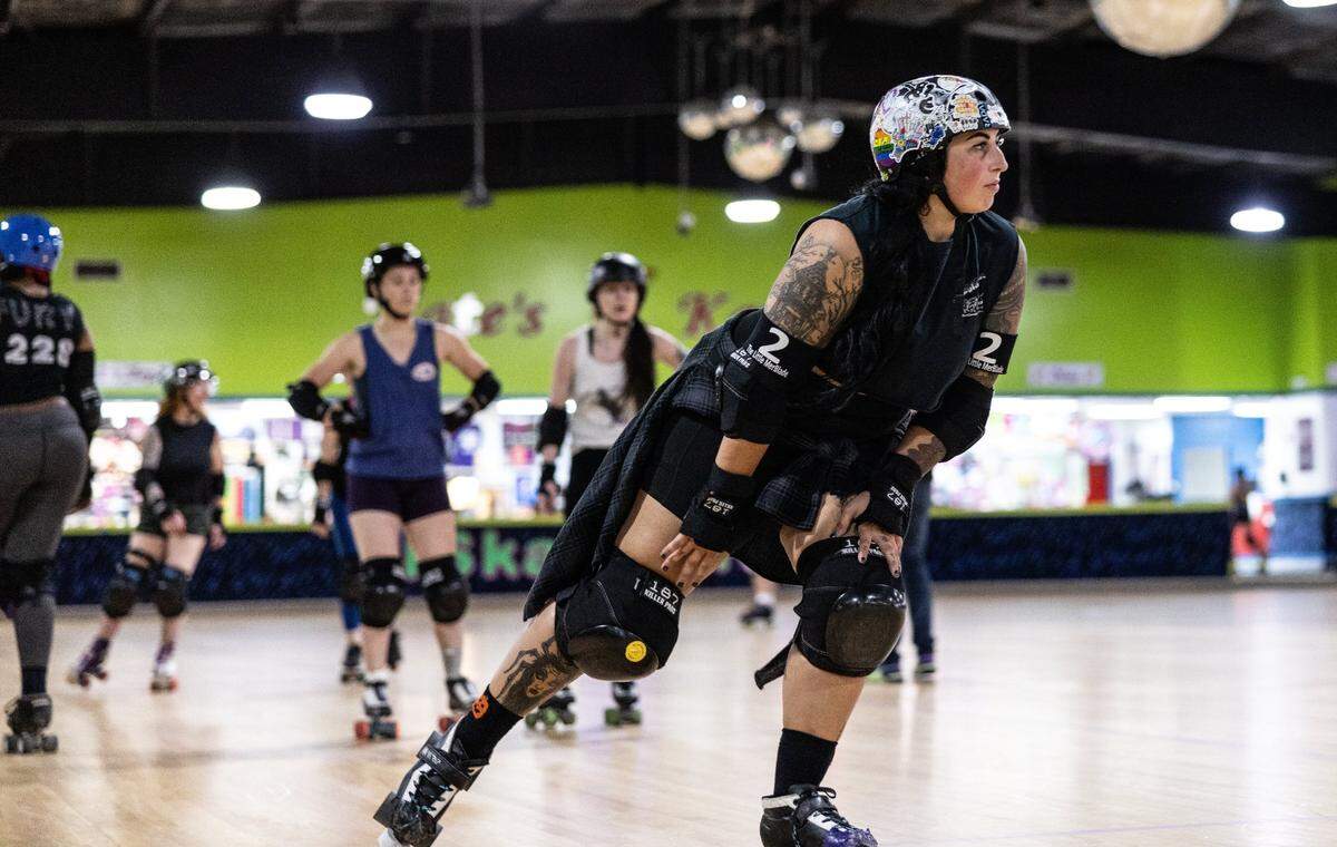 Haley Holland “The Little MerBlade” skates during a cool down at Charlotte Roller Derby practice at Kate’s Skating Rink in Indian Trail, N.C., on Sunday, July 30, 2023.