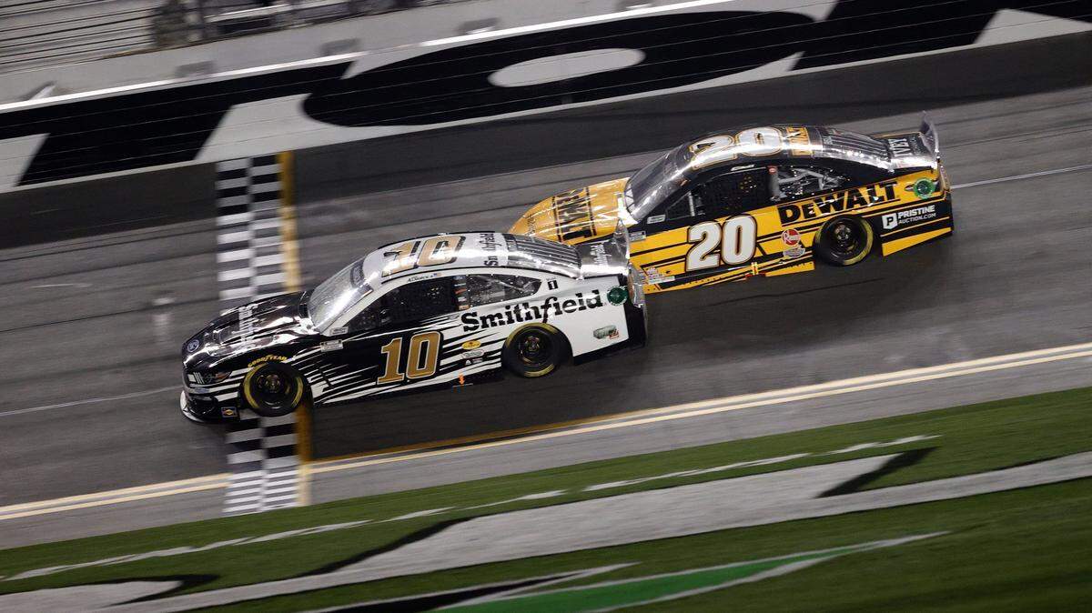 Aric Almirola, driver of the No. 10 Smithfield Ford, crosses the finish line to win over Christopher Bell in the first Daytona Duel last month. Since then, Almirola has struggled on NASCAR tracks.