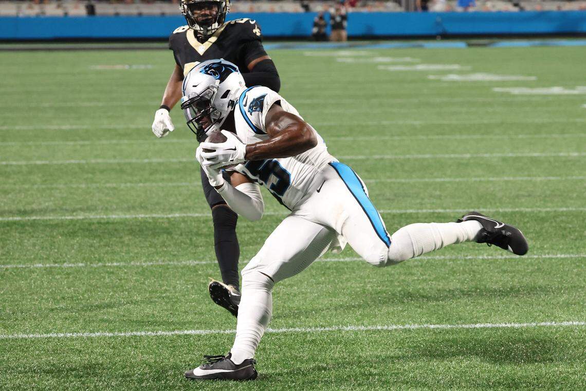 Carolina Panthers wide receiver Jonathan Mingo secures a pass reception from quarterback Bryce Young during fourth-quarter action against the New Orleans Saints at Bank of America Stadium on Monday, September 18, 2023. The Saints defeated the Panthers 20-17.