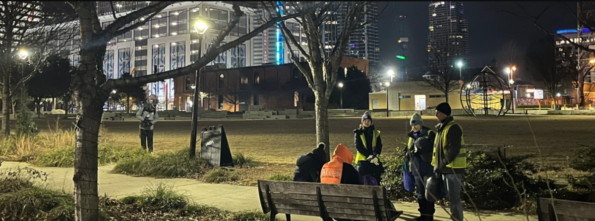 Mecklenburg County’s annual homeless count reported an all-time high in people living outside. Seen here are county workers on the Point-in-Time count from January.