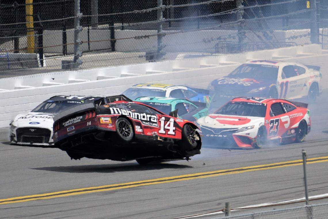 Chase Briscoe (14) lifts and spins in the air along the front stretch after coming out of turn 4 during a NASCAR Cup Series auto race at Daytona International Speedway, Sunday, Aug. 28, 2022, in Daytona Beach, Fla. (AP Photo/Phelan M. Ebenhack)