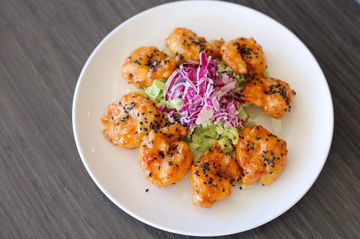 You can start off your meal at The Office Craft Bar & Kitchen with an order of Bang Bang Shrimp ($12). 