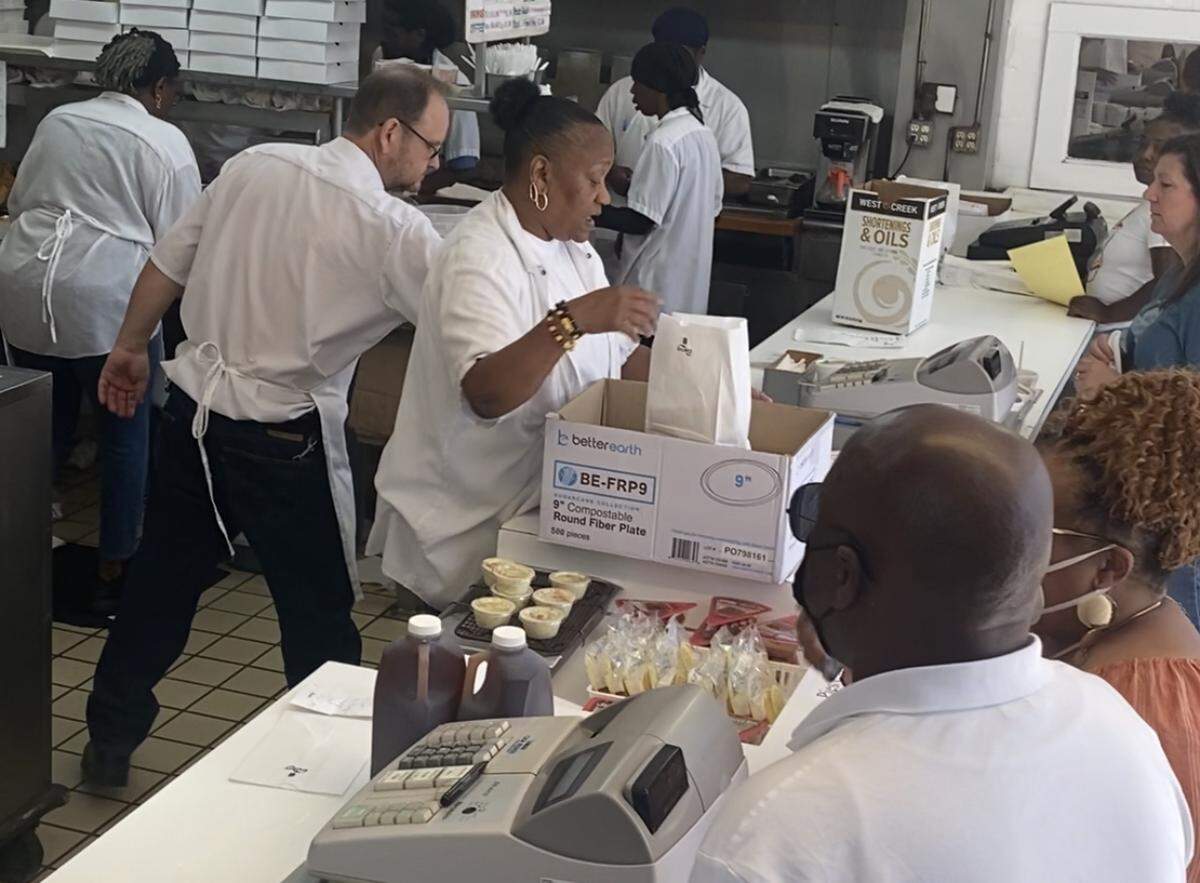 After hearing the news that Price’s Chicken Coop would be closing after 59 years, a crowd gathered at the iconic Charlotte fried chicken spot.