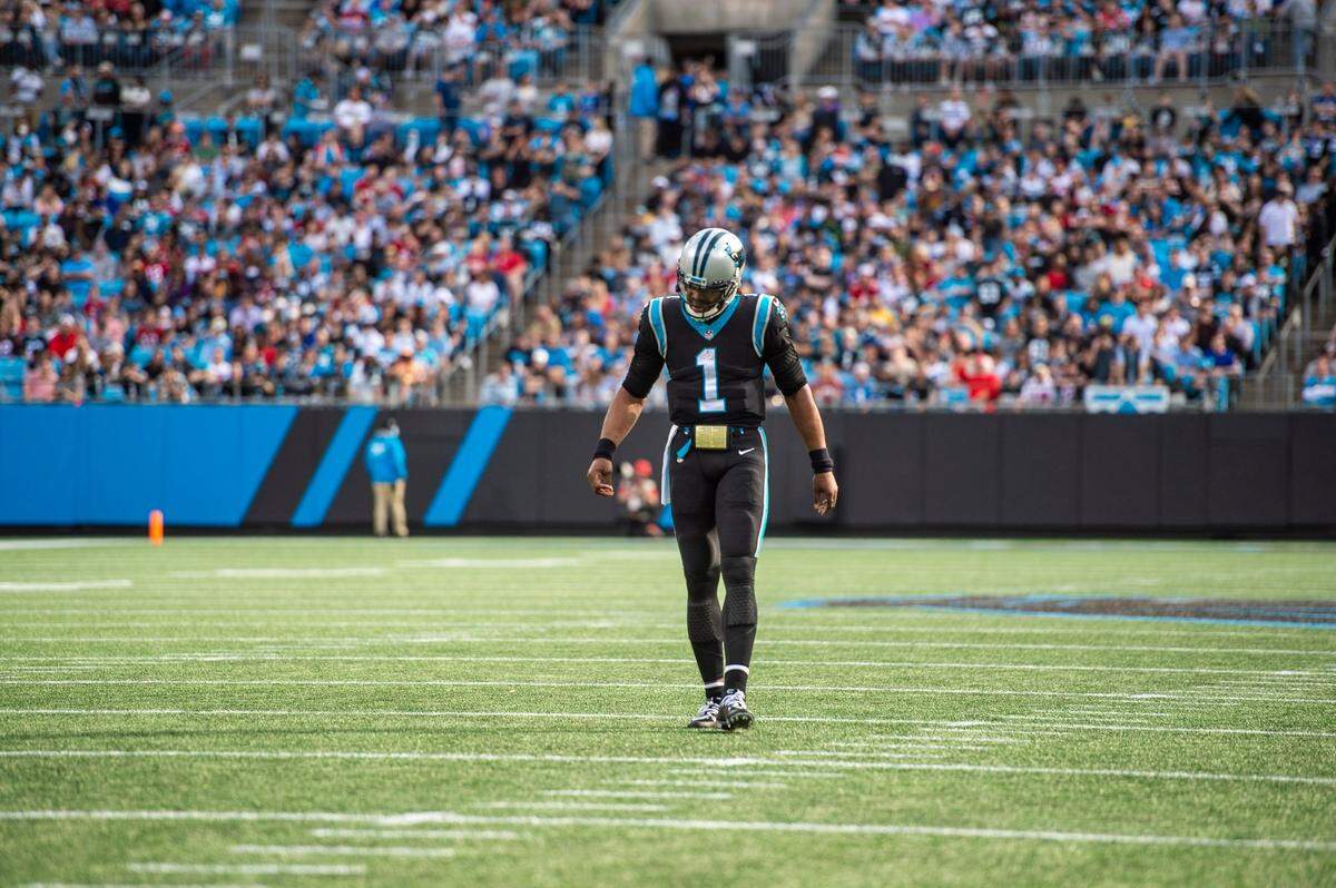 Panthers quarterback walks downfield between plays during the game against the Buccaneers at Bank of America Stadium on Sunday, December 26, 2021 in Charlotte, NC.