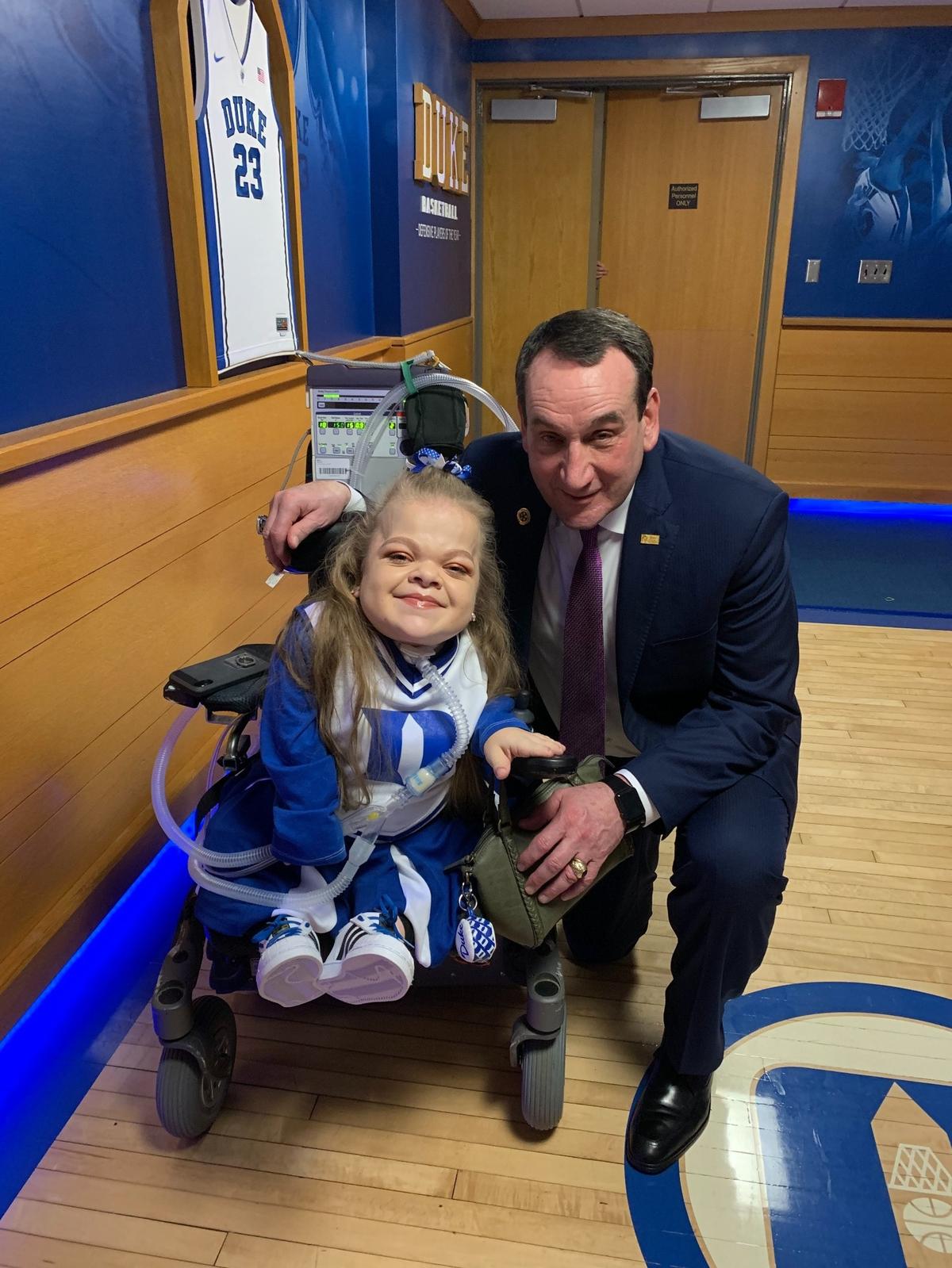 Abby with Duke men’s basketball coach Mike Krzyzewski.