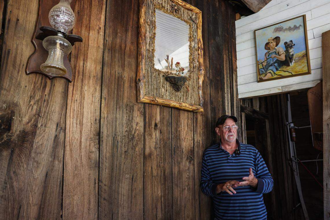 Danny Hensley recounts his experience with Helene in his general store in Pensacola in September.