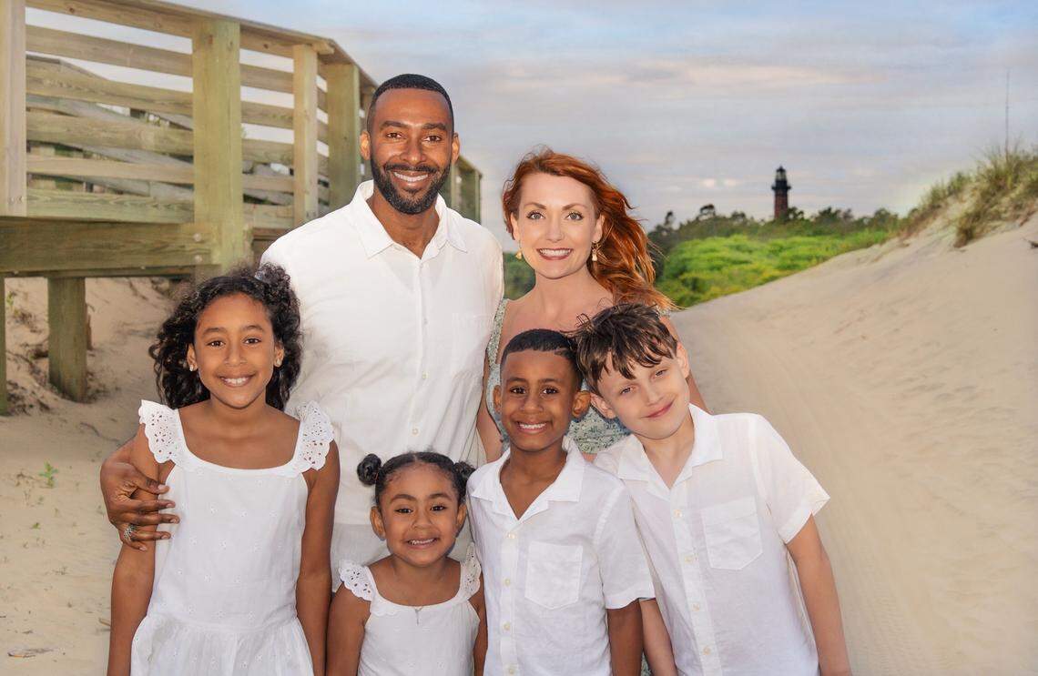 A photo of Fred and Marley taken in Corolla, N.C., on the Outer Banks, with (from left) his daughter Carolina, his daughter Johanna, his son Ezra, and her son Owen.