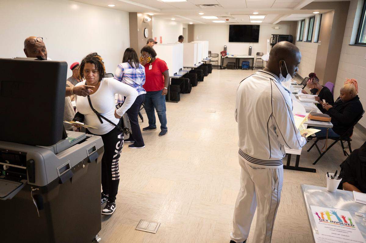 Tens of thousands of NC voters were eligible to cast a ballot in 2022, but don’t have the same rights in 2023 becaue of a court ruling in April. In this file photo, voters cast their ballots for midterm elections at West Charlotte Recreational Center on Tuesday, November 8, 2022.
