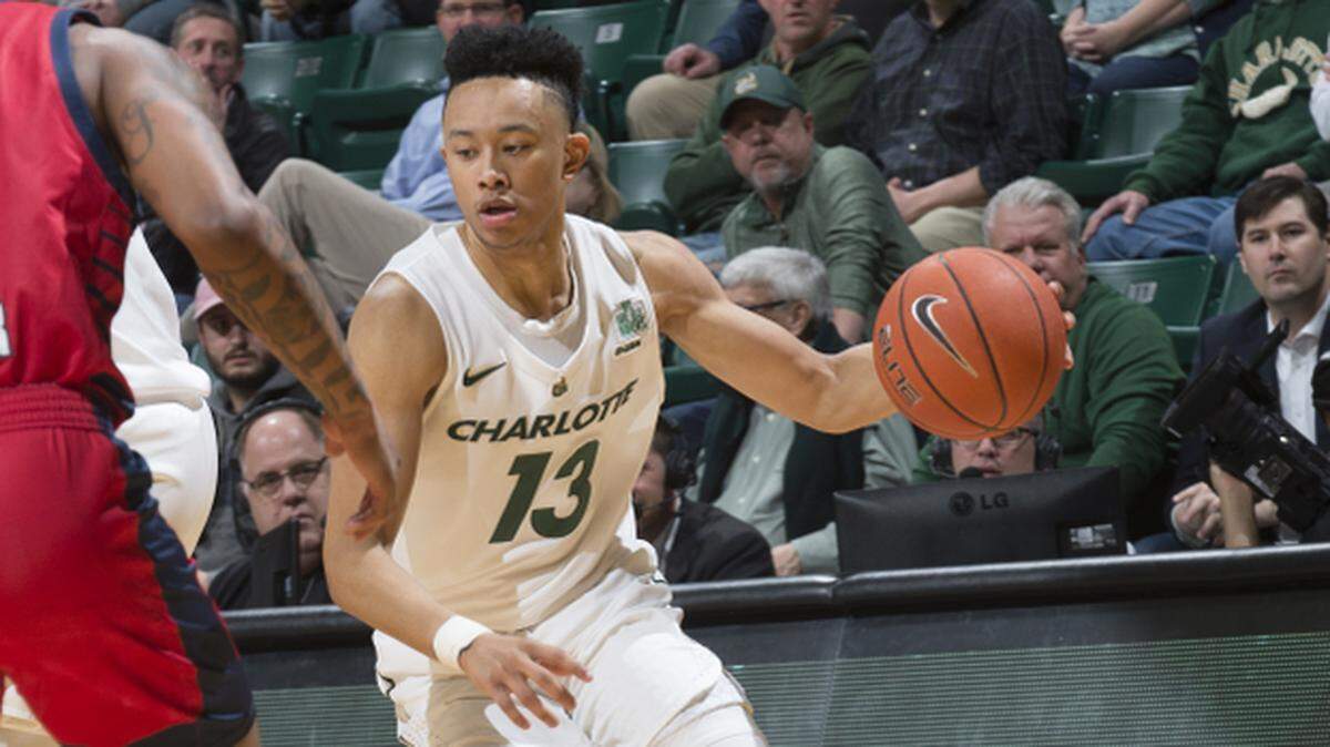 Charlotte’s Jordan Shepherd (13) drives against Florida Atlantic.