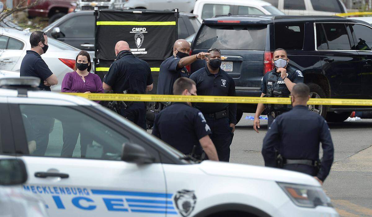Charlotte-Mecklenburg Police investigate the scene of a shooting Tuesday, March 23, 2021 at Den’s Mart at the corner of The Plaza and Parkwood Ave. in Charlotte, NC. LaTannya Jennings of New York said that her brother, Frankie Jennings was the victim of the shooting. Tuesday was Frankie Jennings, 32nd birthday.