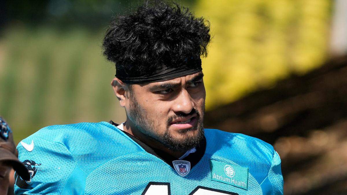 Carolina Panthers linebacker Eku Leota (46) walks to the practice fields during training camp at Wofford College.