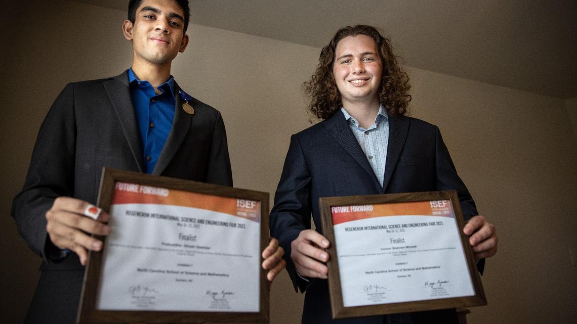 Prabuddha Dastidar, left, and Connor Mitchell, right, pose for a portrait in Waxhaw, N.C., on Tuesday, June 22, 2021.
