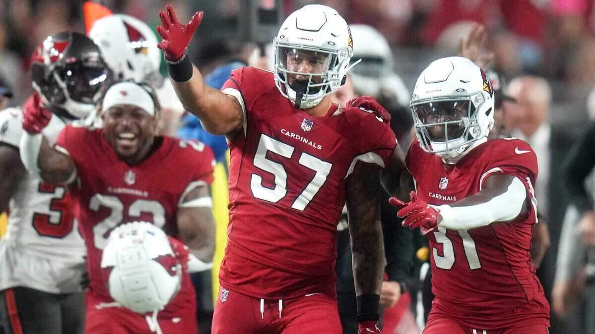 Arizona Cardinals special teams player Kamu Grugier-Hill (57) celebrates his first down catch on a fake punt against the Tampa Bay Buccaneers at State Farm Stadium.