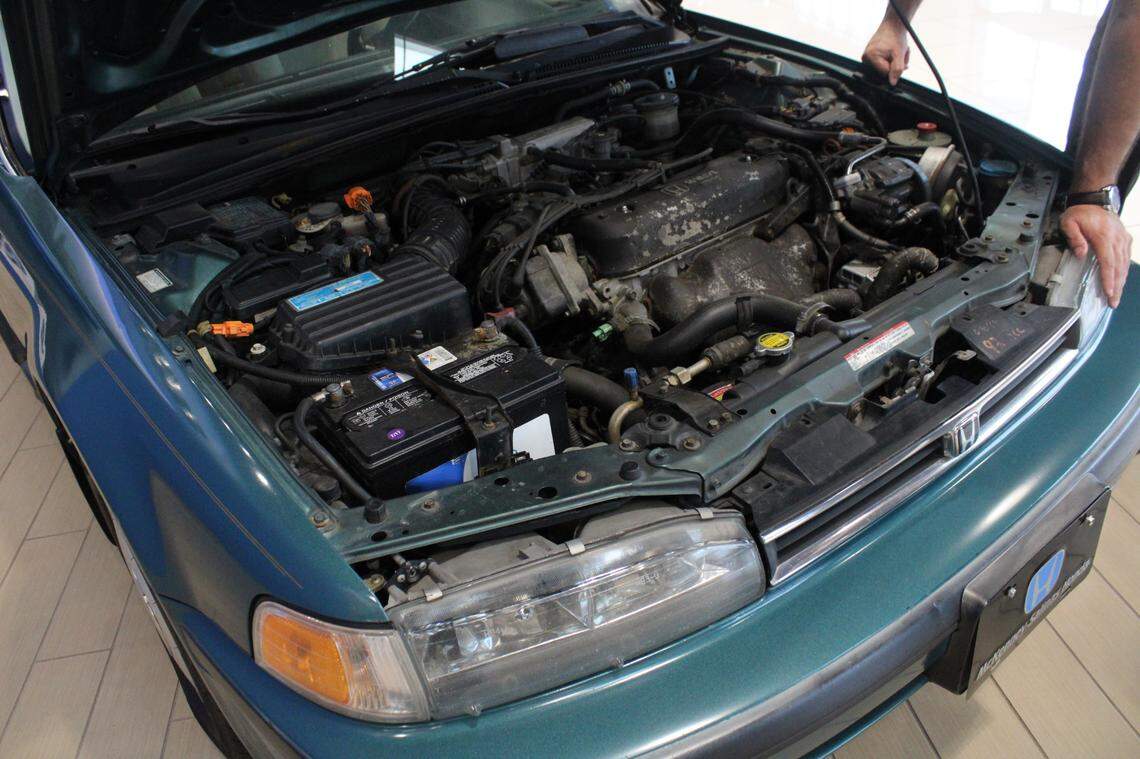 A 1992 Honda Accord EX wagon on display at McKenney-Salinas Honda in Gastonia, NC, has its original engine, transmission and radio. The car has nearly a million miles on it.