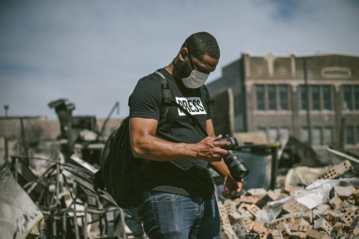 E. Mackey traveled to 11 cities in three months to capture images of the protests for racial justice in the summer of 2020.