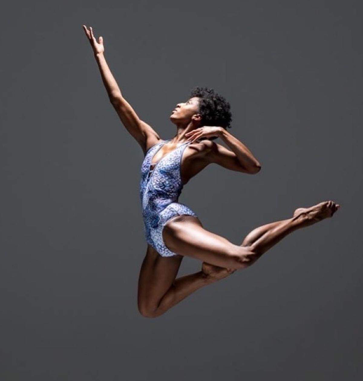 Dancer Sloan Pearson appears suspended in midair. This photo was taken during a photography workshop led by Rachel Neville. Pearson, a former Charlotte dancer who now lives and dances in New York, acts as a model during the workshops which are designed to help photographers learn to shoot movement.