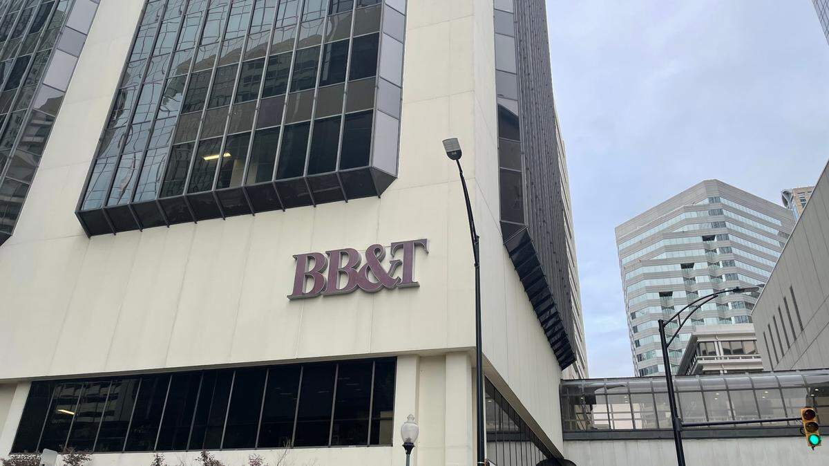 The side of the tower at 200 S. College St. will lose the BB&T logo early next year after Truist, the combination of BB&T and SunTrust, closes a bank branch in the building.