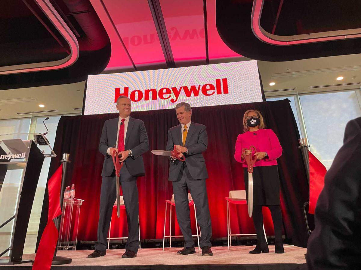 Honeywell named its president and COO as its new CEO. Vimal Kapur will replace Darius Adamczyk June 1. Seen here, Adamczyk, Gov. Roy Cooper and Mayor Vi Lyles were at the grand opening of Honeywell’s uptown headquarters in December 2021.