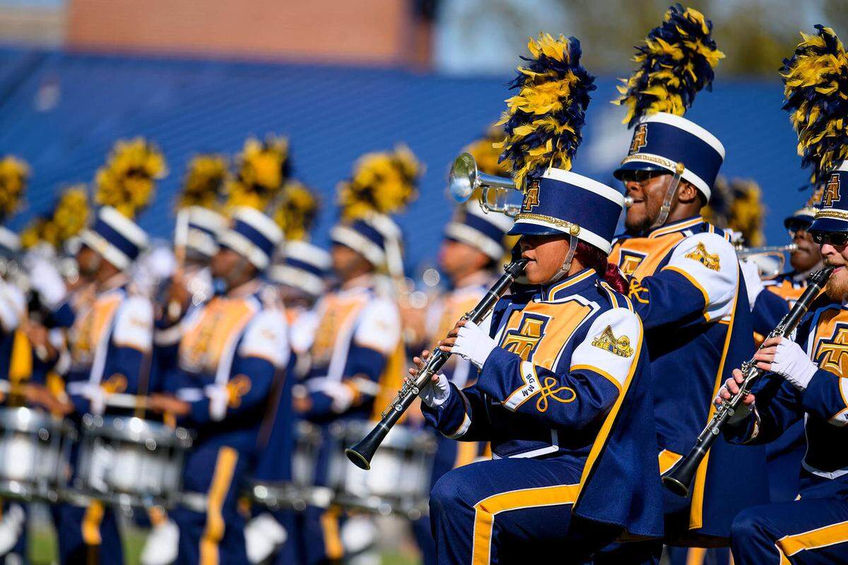 North Carolina A&T State University’s The Blue and Gold Marching Machine performs different genres of music using all styles of marching.