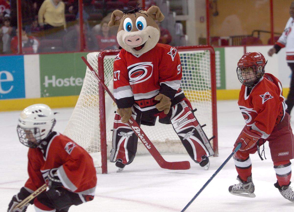 Stormy, the Carolina Hurricanes mascot, plays goalie for a youth hockey league exhibition game between periods of the final regular season game against Buffalo in 2006.