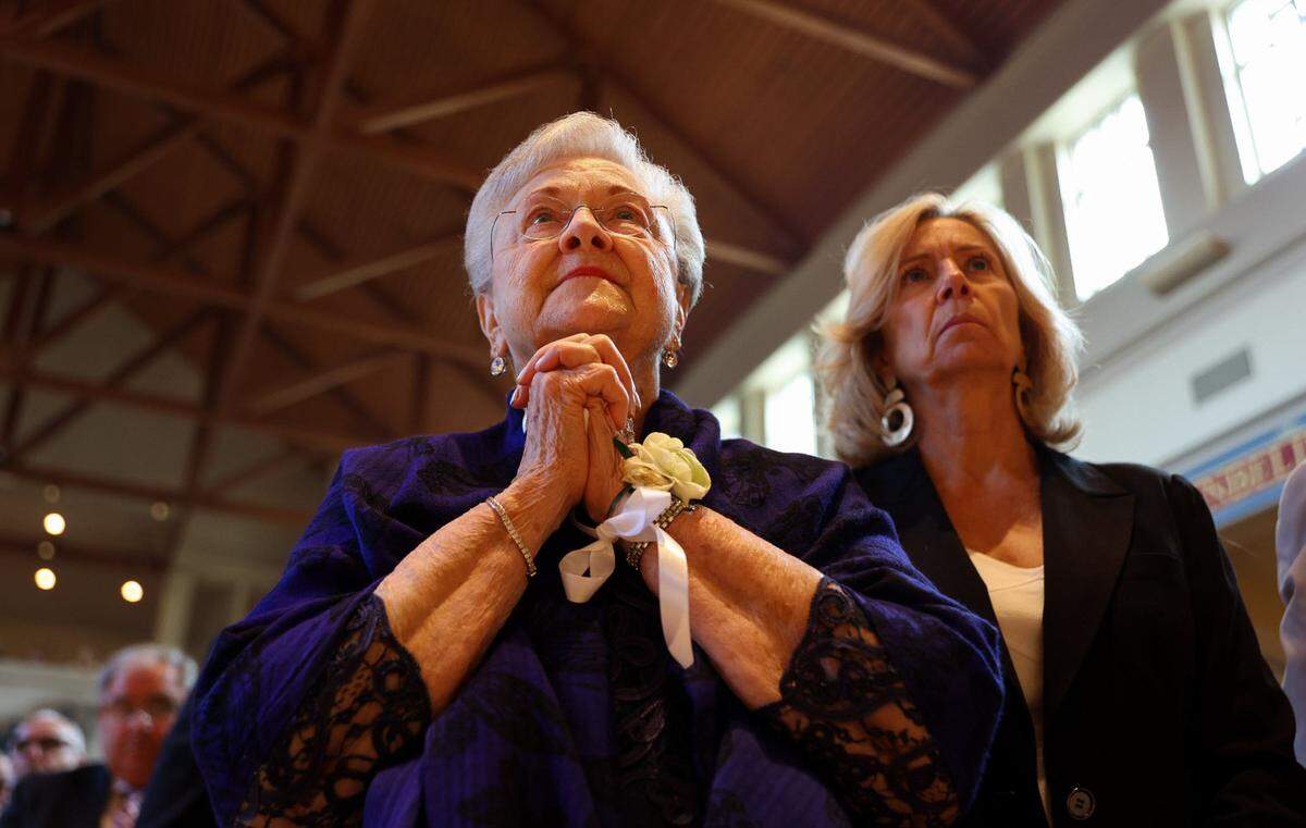 Bev Martin, the mother of Bishop Michael T. Martin, and one of his sisters, watch over the ordination at Saint Mark Catholic Church in Huntersville on May 29, 2024.
