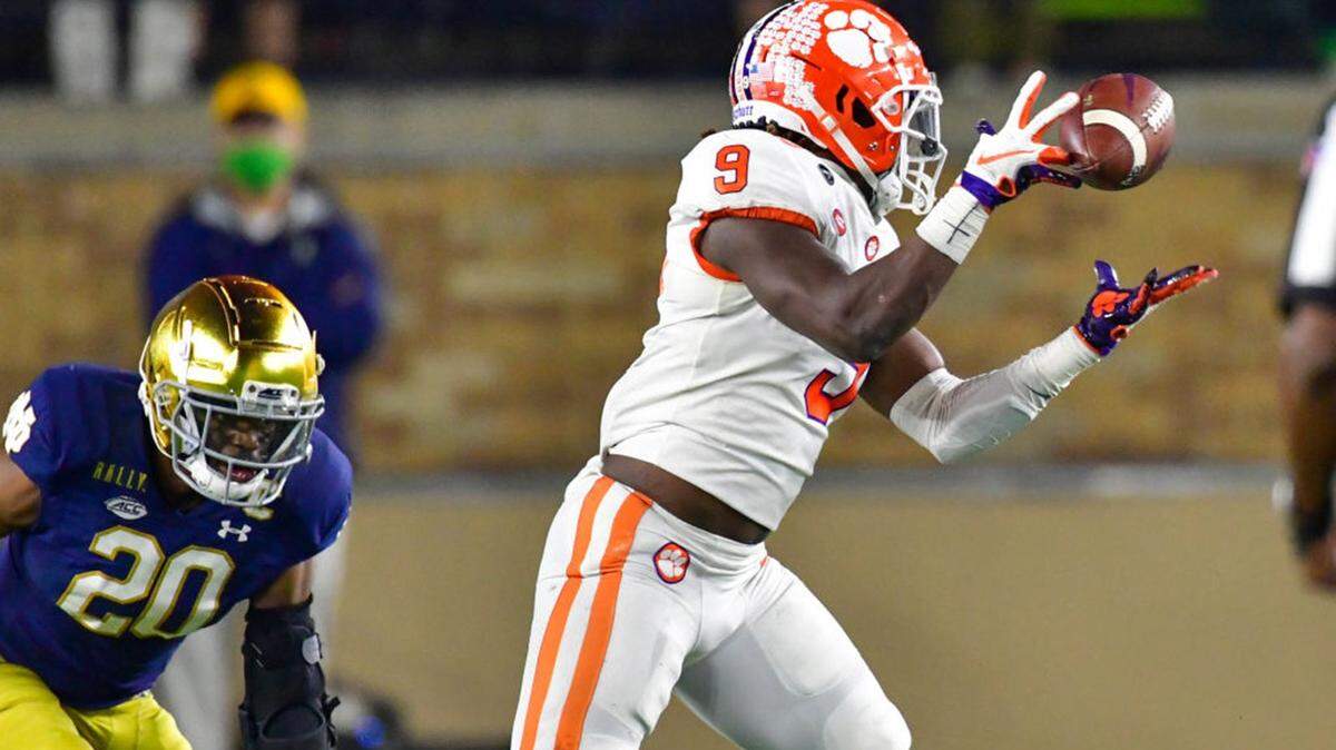 Clemson Running back Travis Etienne (9) drops a pass as Notrew Dame safety Shaun Crawford (20) defends in the second quarter at Notre Dame Stadium on Nov. 7. The teams will meet again in Charlotte on Dec. 19. (Photo by Matt Cashore/Pool/Getty Images)
