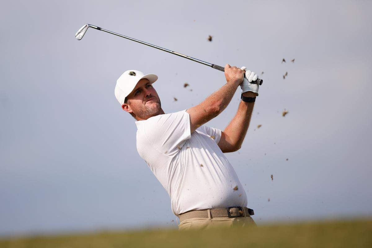 Taylor Pendrith tees off on the fourteenth hole during the fourth session of the Presidents Cup at Quail Hollow Club in Charlotte, N.C., Saturday, Sept. 24, 2022.