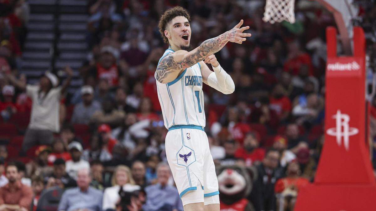Charlotte Hornets guard LaMelo Ball (1) reacts after scoring a basket during the fourth quarter against the Houston Rockets at Toyota Center.