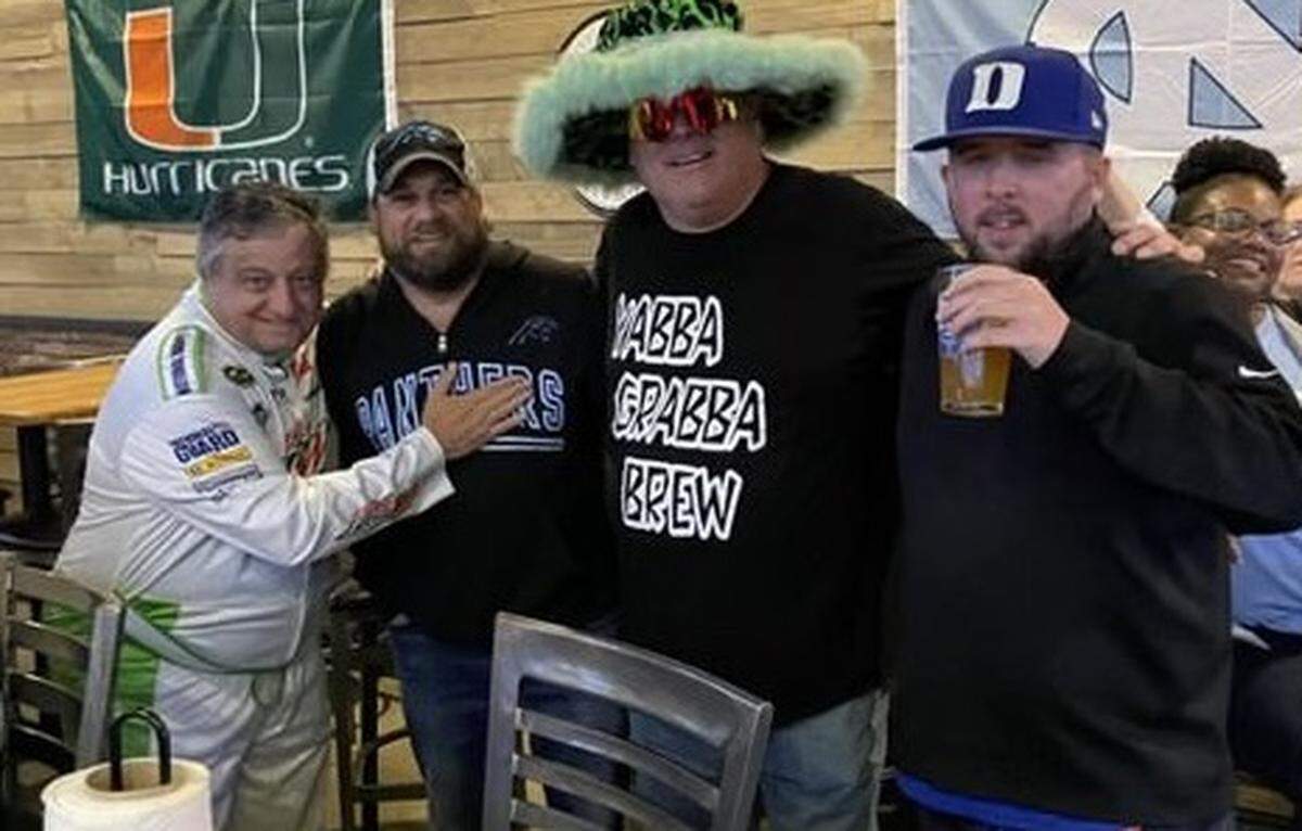Mark Baker, at left, with — from left to right —&nbsp;Chris "Mac" McClain, Dave Ballard (aka Sir Loin of Beef, another famous caller to the show), and Travis "T-Bone" Hancock.