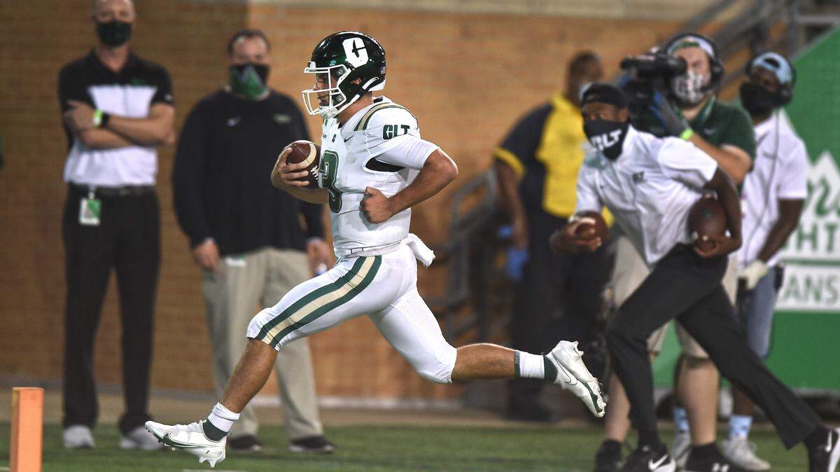 Charlotte quarterback Chris Reynolds (3) scores a touchdown against North Texas.