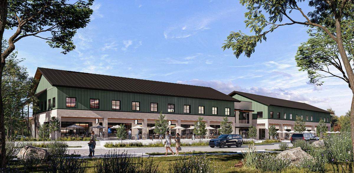 A rendering of the shopping plaza set to be built in West Charlotte’s River District. The 28,200-square-foot, two-story mixed-use building will house the district’s first retailers, from restaurants and shops to medical facilities and other neighborhood goods.