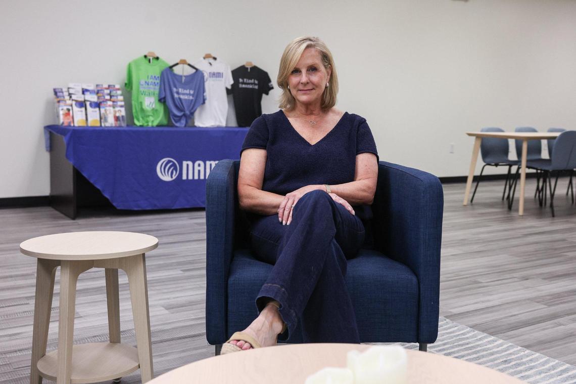 Kate Weaver, executive director of NAMI Charlotte, sits in the resource center in the Dilworth neighborhood of Charlotte on May 14, 2025. NAMI offers free mental health support, resources, education and online groups.