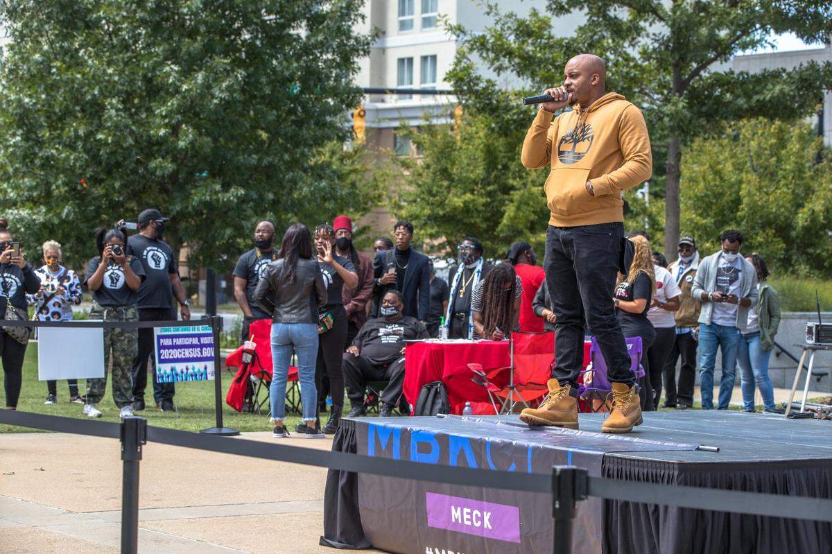 Greg Jackson of Heal Charlotte speaks at a rally for Jacob Blake Jr. in Romare Bearden Park on Sunday, September 20, 2020. Blake is a Black man who was paralyzed after being shot by a white police officer in Kenosha, Wisconsin.