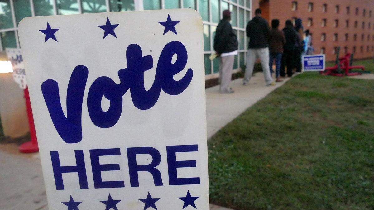 Election officials say a racial dispute involving a judge race broke out Thursday at the Beatties Ford Library early-voting site.