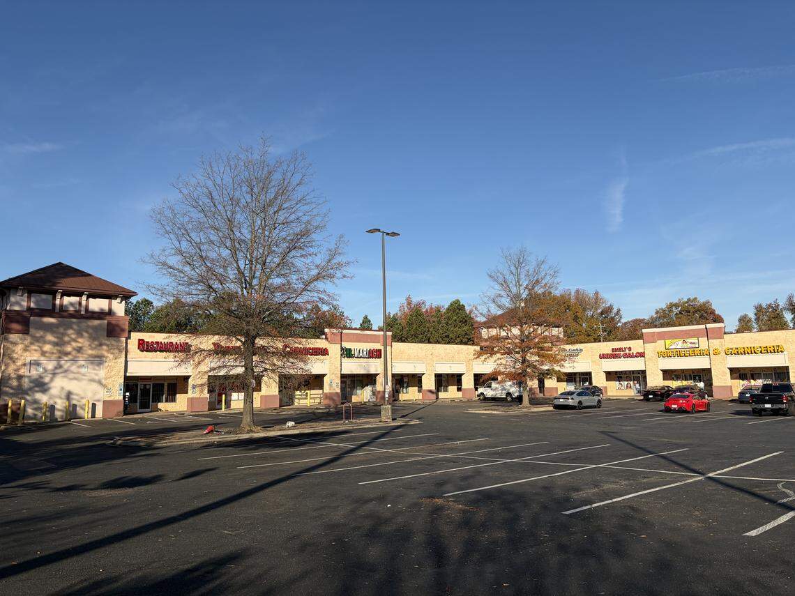 The usually bustling parking lot of the El Mariachi shopping center on North Tryon Street sits empty, as its predominantly Hispanic-customer base stays home due to Border Patrol raids. 