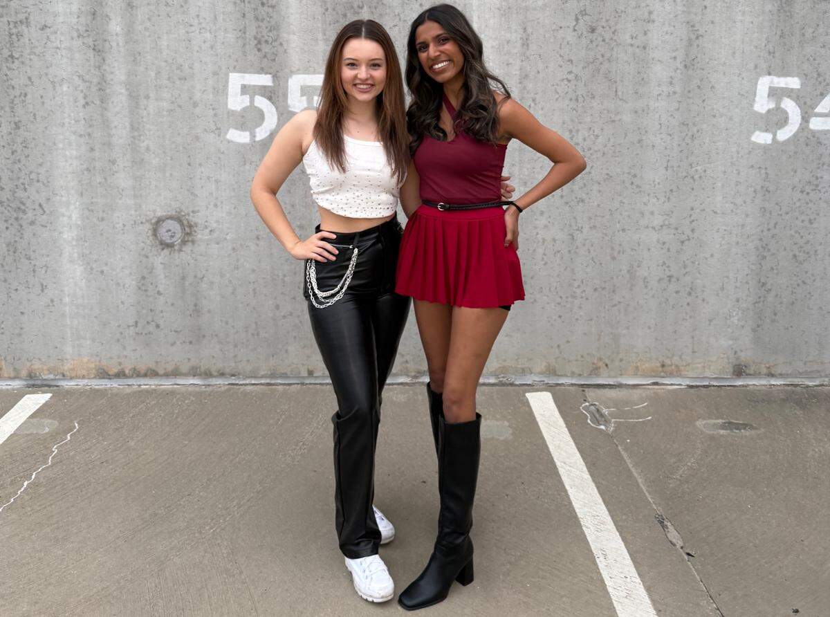 Aespa fans pose pre-concert in Charlotte.