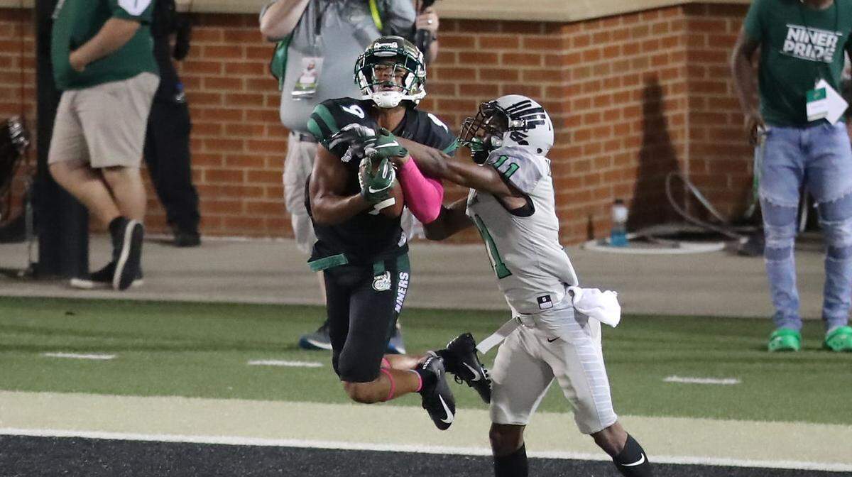 Charlotte wide receiver Victor Tuckers catches the game-winning touchdown against North Texas at Richardson Stadium in Charlotte in 2019.