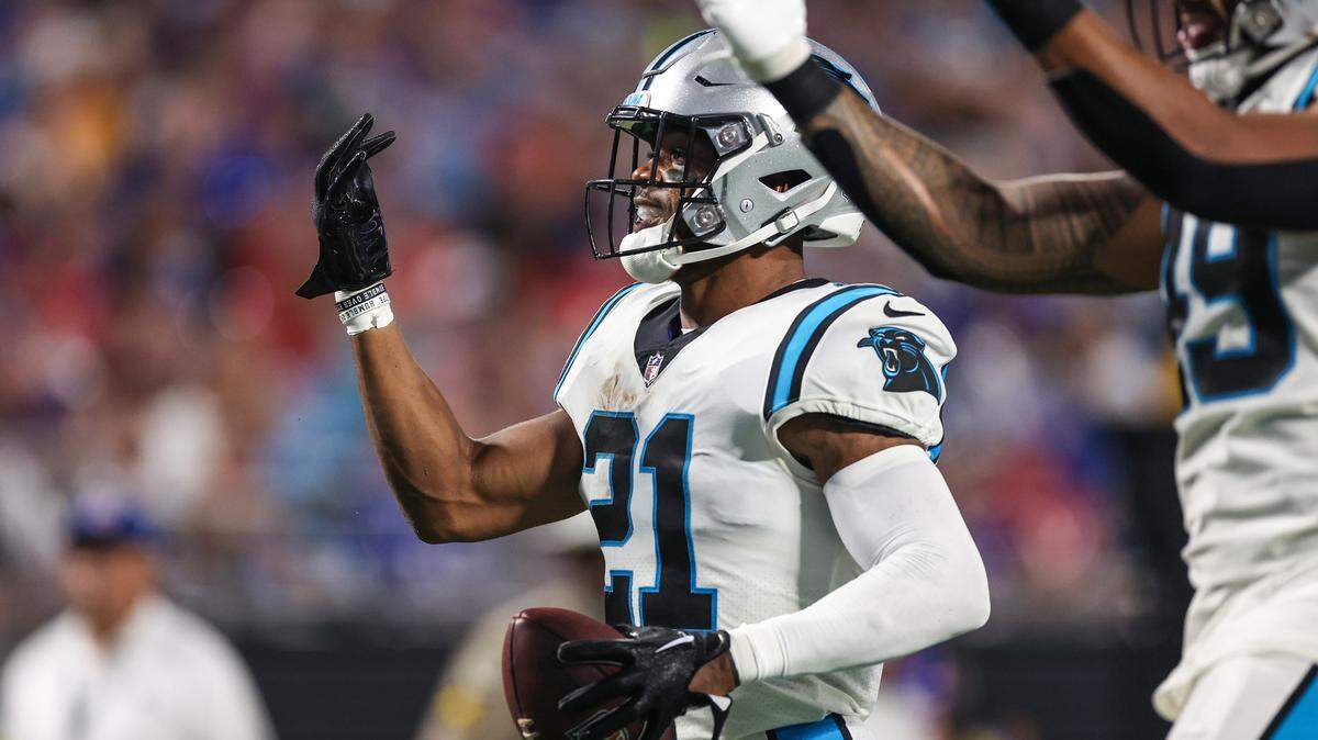 Panthers safety Jeremy Chinn gestures toward the stands after an interception during the game against the Bills at Bank of America Stadium on Friday, August 26, 2022 in Charlotte, NC.