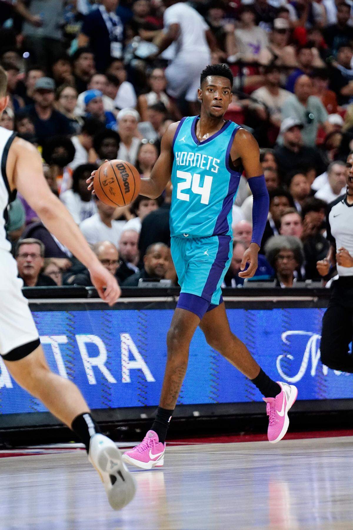 Charlotte Hornets forward Brandon Miller (24) dribbles the ball against the San Antonio Spurs during the first half at Thomas & Mack Center.