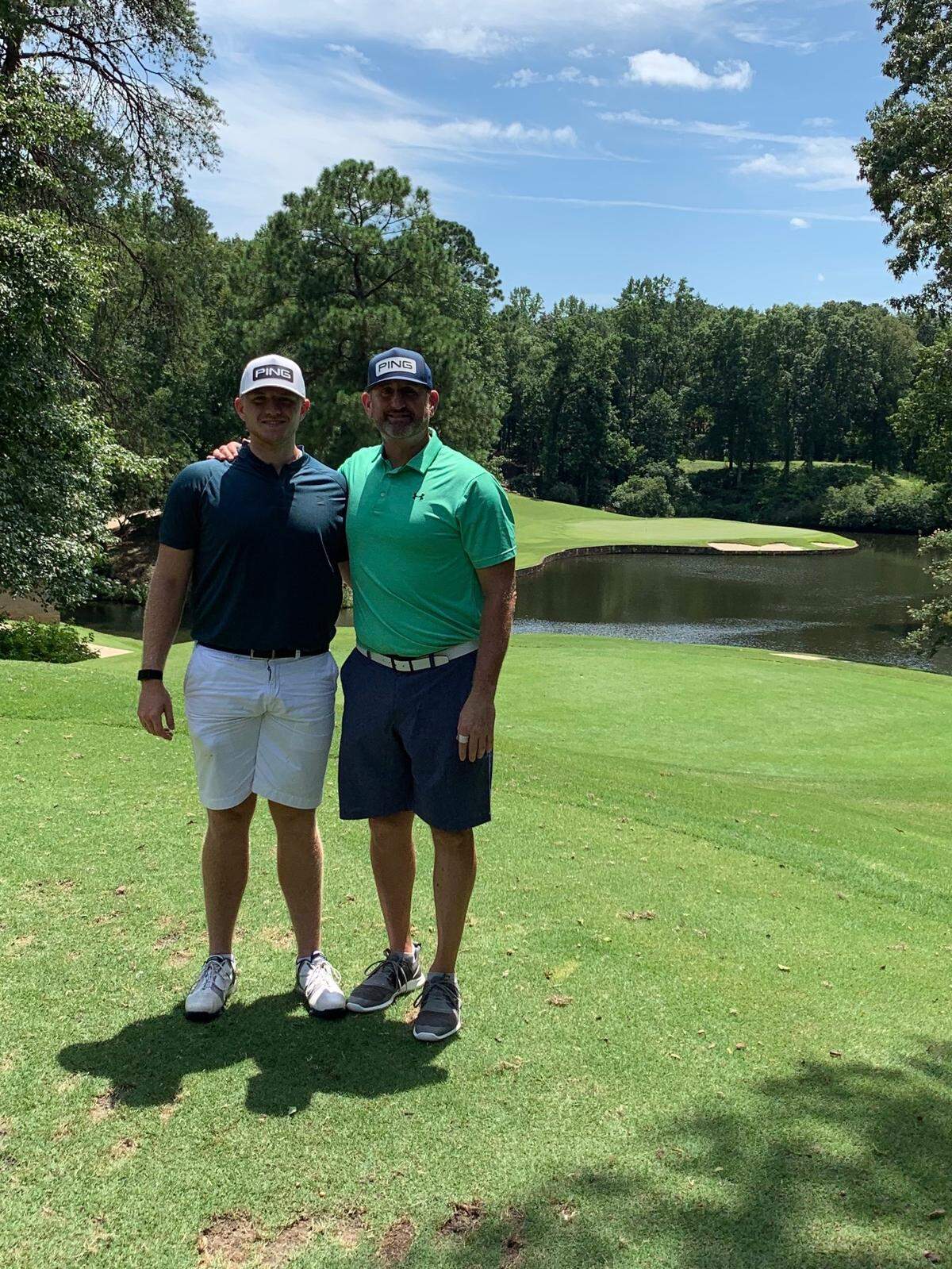 Carolina Panthers long snapper Thomas Fletcher (left) and his dad, Tom Fletcher.