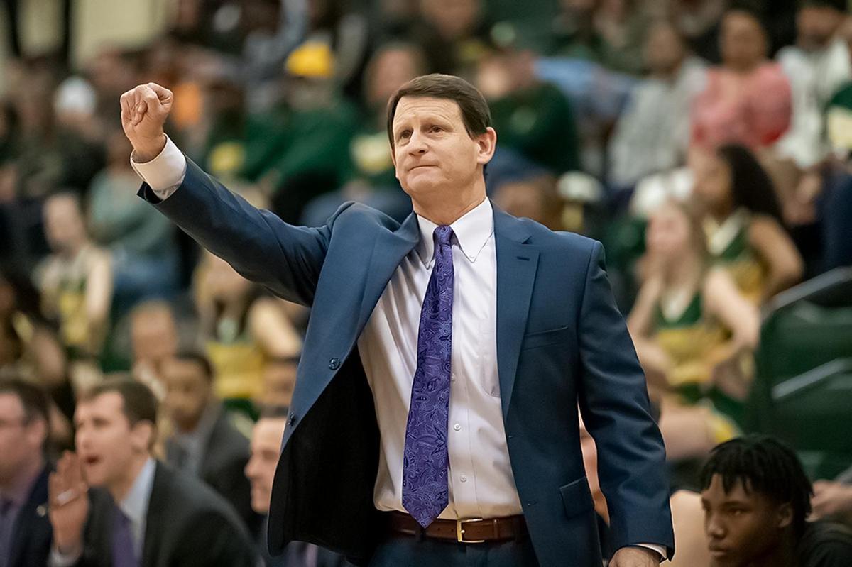 Ardrey Kell Head Coach Mike Craft instructs his team during early 1st half action.