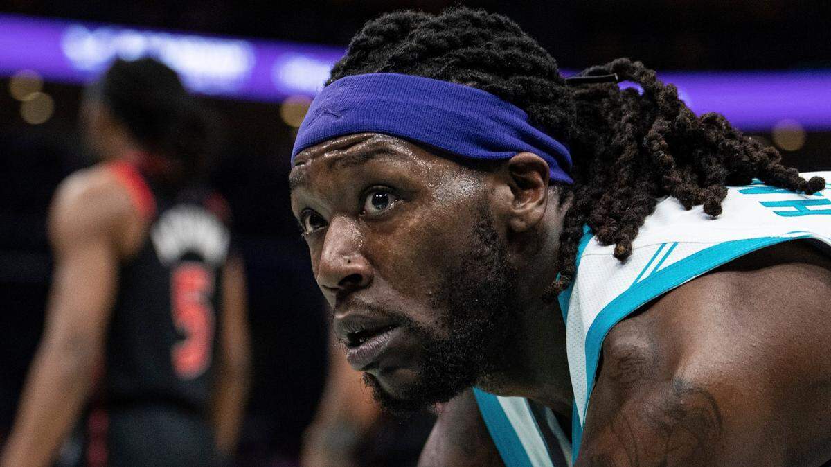 Charlotte Hornets center Montrezl Harrell (8) plays against the Toronto Raptors during the first half of an NBA basketball game in Charlotte, N.C., Friday, Feb. 25, 2022. (AP Photo/Jacob Kupferman)