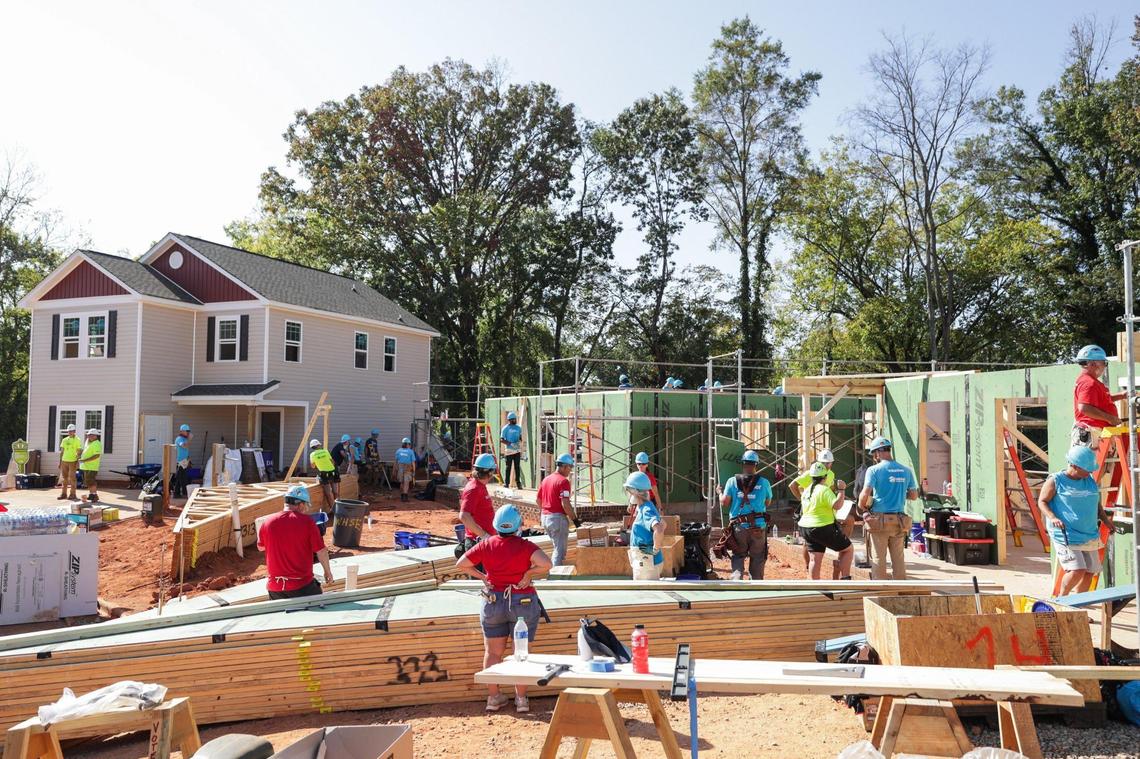 More than 3,000 volunteers built 27 homes for the 2023 Jimmy & Rosalynn Carter Work Project in the Meadows at Plato Price development the week of Oct. 2, 2023, in Charlotte.