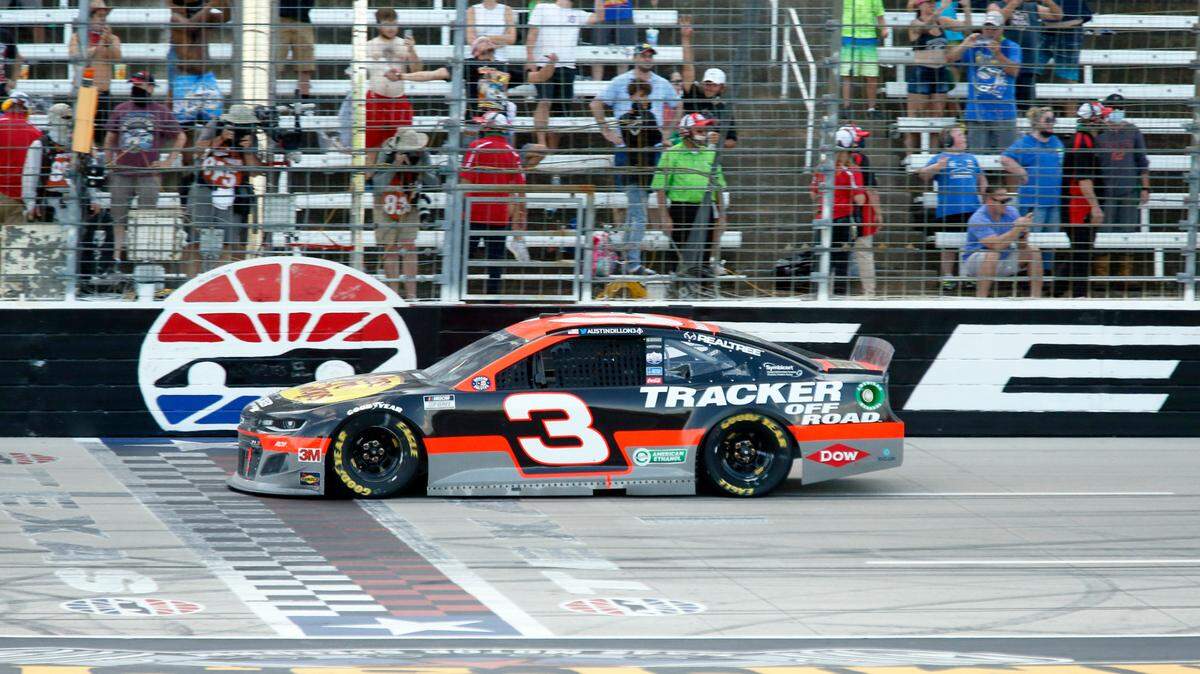 Austin Dillon crosses the finish line to win the NASCAR Cup Series auto race at Texas Motor Speedway in Fort Worth, Texas, Sunday, July 19, 2020. (AP Photo/Ray Carlin)